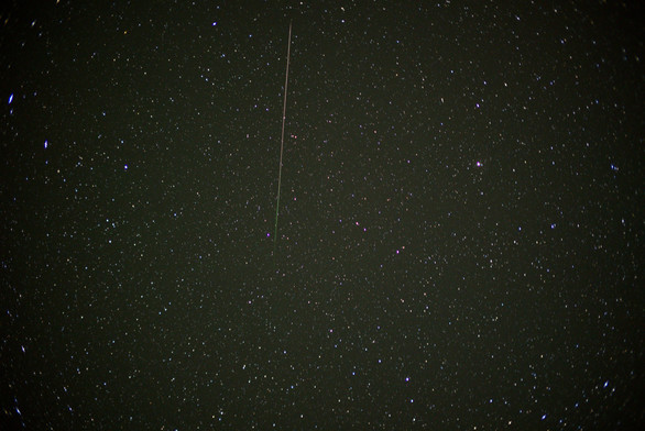 This long meteor does appear to be a Lyrid because an extension of the path points toward the shower radiant.

Where in the sky is this? Do you recognize the star field? See the next image...