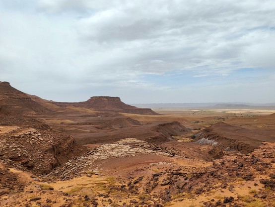 Landscape photograph of the rocky Sahara Desert in southern Morocco.