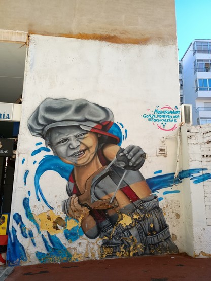 Grafiti niño con gorra antigua y tirachinas