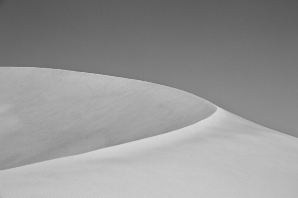 A black and white sand dune in the desert