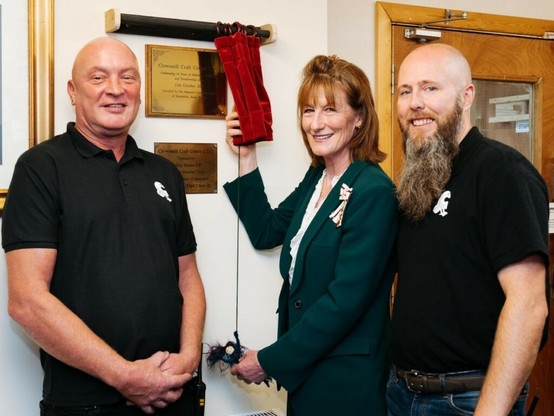 Lord Lieutenant of Shropshire Anna Turner with Crowsmill Craft Centre founders Mark Chiswell, left, and Dickon Pitt who has now received an invite to the palace