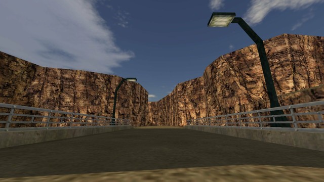 In this picture you can see the perspectives of the previous picture, only this one in the other direction. You can see a bridge. To the right and left are metal railings. On the right is a black street lamp. Just like at the end of the bridge on the left. In the background you can see that it continues to the left. This is on the map cs_siege in the game Counter-Strike 1.6.