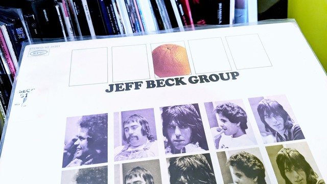 Album cover of Jeff Beck Group - self-titled album (vinyl). Record collection in the background.