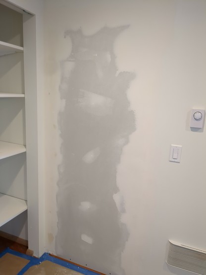 The same opening, but with sheetrock on and mud and tape applied.