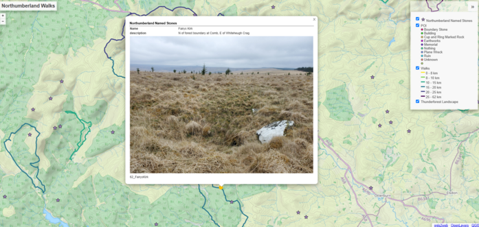 a pop-up on a leaflet map of my walks, which shows an area of countryside and forestry dotted with circles (points o finterest I've found) and stars (named stones of northumberland) as well as walking routes I've done. The pop up shows Fairys Kirk, a whit boulder in long rough grass on the edge of a conical depression.