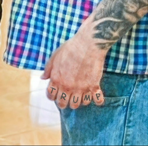 6-finger photo of Kilmar Garia's tattooed hand spelling TRUMP -with an extra finger and knuckle for the P