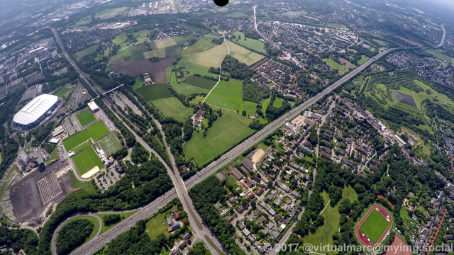 An aerial photo of Gelsenkirchen Erle and Beckhausen with the Veltins Arena at the left.