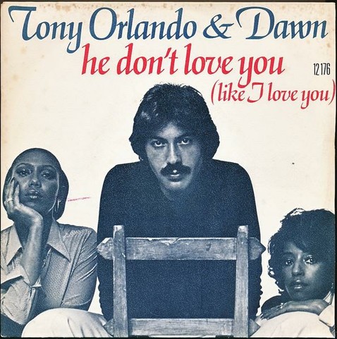The front cover of Tony Orlando and Dawns He Dont Love You Like I Love You single