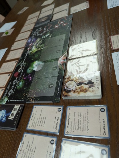 Game board with locations, characters, clues, and rules.