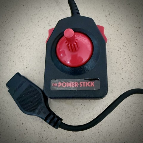 The first Amiga product ever. The power-stick for the Atari 2600. They made those as a way to generate some income (before unfortunately the video game market crashed) and also to use it as a cover during trade shows for their real goal which was (at the time) to develop  game console. Check out the Amiga logo on the DB9 connector.