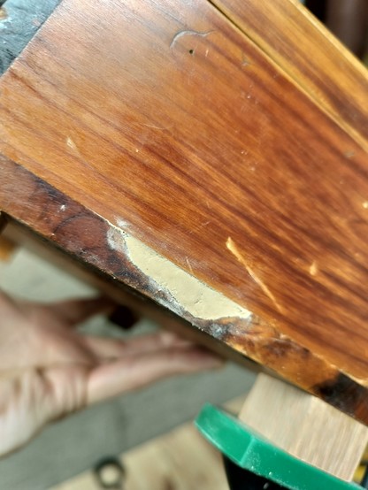 The gouge filled with wood glue