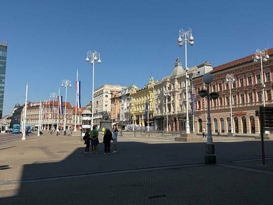 City square line with 3 story buildings (perhaps 19th century?)