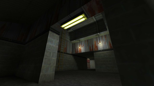 In this picture you can see that you are in a room to the left of the second entrance. From left to right you can see a wall, a passageway where a yellow illuminated lamp is attached to this above, another room where a yellow ladder leads up to the left and two illuminated light bulbs in the other room this hang from the ceiling, as well as a hallway, which leads to the left into another room and also at the top of the passage a yellow illuminated lamp is attached. This is on the map de_nuke in the game Counter-Strike 1.6.
