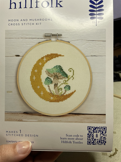 A picture of the box depicting three mushrooms and a crescent moon shape that is what my final product should look like once finished.