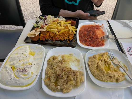 Mezze plate at a hole in the wall restaurant in Hyères consists of about 6 different things. The falafel were merely OK, but it was so nice to have the variety.