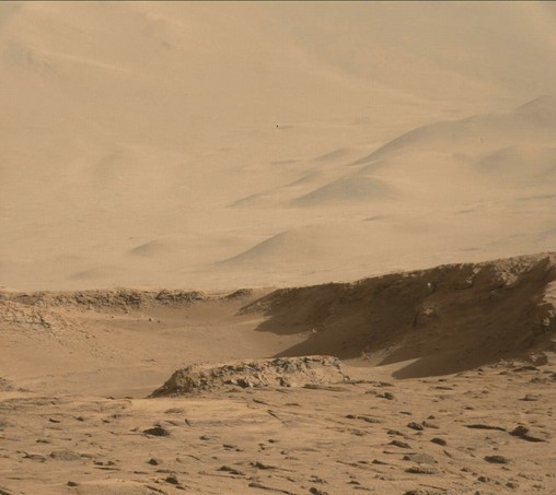 An ochre toned photography capturing a Martian landscape.