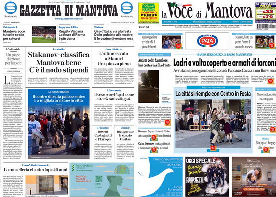 Una schermata di un dispositivo che mostra le prime pagine di due giornali locali italiani: "Gazzetta di Mantova" e "La Voce di Mantova". La "Gazzetta di Mantova" ha un titolo principale che parla di una classifica e di stipendi, mentre "La Voce di Mantova" ha un titolo che menziona ladri armati di forconi. Entrambi i giornali presentano vari articoli e immagini, con temi che spaziano da eventi locali a notizie di cronaca.  .