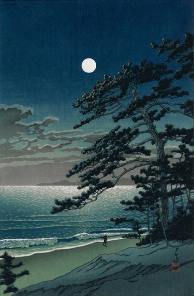 A bright full moon shines down out of a starless night sky, illuminating a single shadowy figure walking along Ninomiya Beach, in Kanagawa Prefecture. Tall wiry pine trees stand on our side of the beach; beyond, the waters of the Pacific are calm, silvered by moonlight.