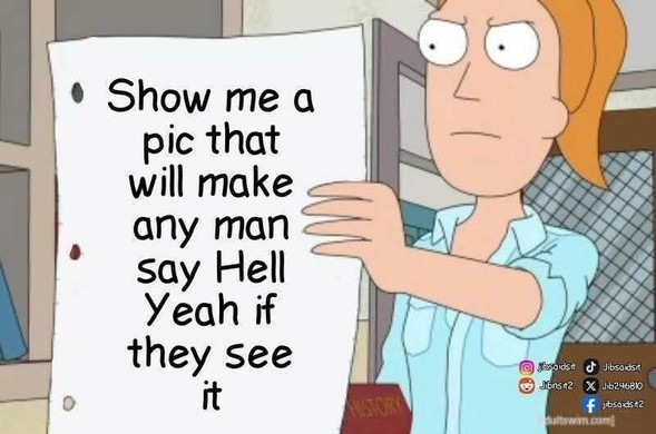 This appears to be a meme. The image features an animated character holding a sign with text that reads, "Show me a pic that will make any man say Hell Yeah if they see it." The character is dressed in a light blue shirt and has a determined expression. The background includes a window and a partially visible American flag, contributing to a patriotic theme. The meme likely aims to evoke a humorous or exaggerated response, playing on stereotypes or common cultural references related to redneck humor and American patriotism.