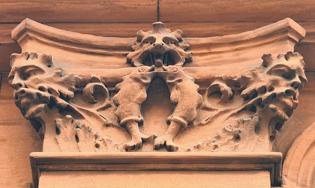 A column capital themed on the Zodiac sign of Gemini.