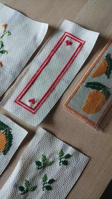 Close up showing the bookmarks with hearts, mango and leaves.
