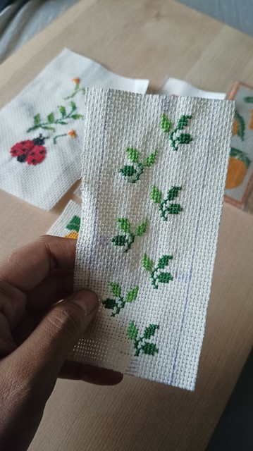 Me holding the bookmark with leaves to show it more clearly, and have an idea of scale.