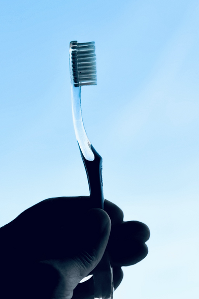 Ordinary toothbrush, the one everyone used to have.
