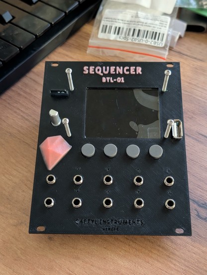 Eurorack module with 3d printed faceplate, pink on black. "Sequencer BTL-01"