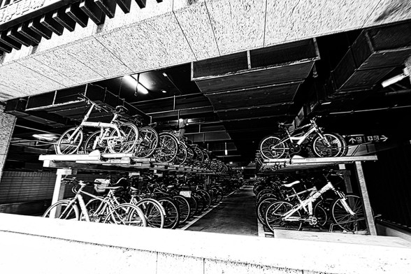 Taipei, known for its dedication to sustainable urban development, has introduced the innovative TUBE RACK—a 3D bicycle parking solution designed to address the city's space constraints and enhance its cycling infrastructure. Developed by designers Tanyi Huang and Tsaiher Cheng, the TUBE RACK features a modular, double-tier design that maximizes parking capacity while doubling as multifunctional urban furniture. It not only accommodates bicycles but also provides seating, space for motorcycles, wheelchair access, and areas for planting greenery. Integrated into areas like Fujin Village and complementing Taipei's extensive bike paths and the YouBike system, the TUBE RACK offers a compact, aesthetic, and community-friendly solution to urban mobility. Its impact and design excellence have earned it multiple awards at the Taipei Design Award, positioning it as a model for sustainable city planning worldwide.