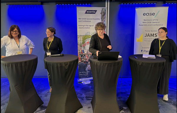 The panellists at the EASE conference podiums.