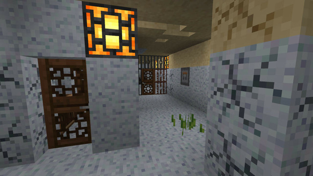 An underground structure with walkways in white and yellow stone.