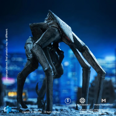 an action figure of  a monster, it  is insect-like, has a small angular head and long thick black legs, walking though a city, seen from the front in a 3 quarter view