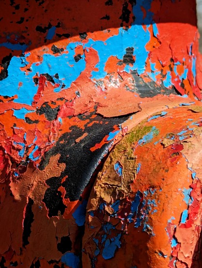 Many colors of paint, peeling off a fire hydrant
