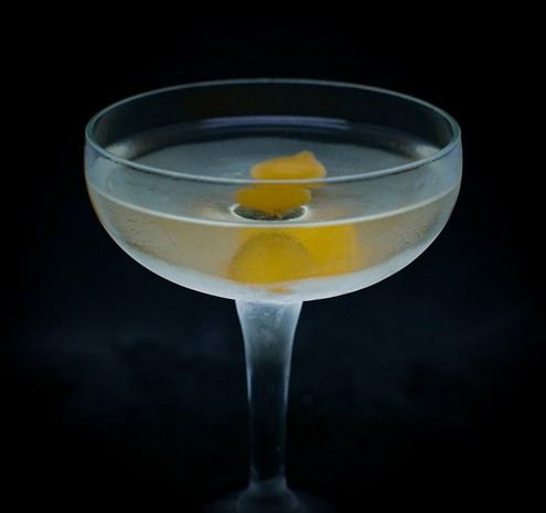 The cocktail itself in a chilled coupe and garnish with two cocktail onions