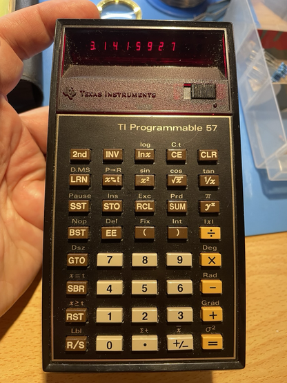 A TI57 calculator with a nice red LED display