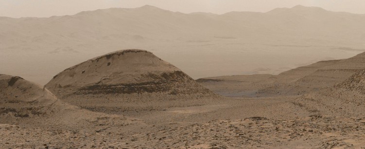 An ochre toned image capturing a Martian landscape.