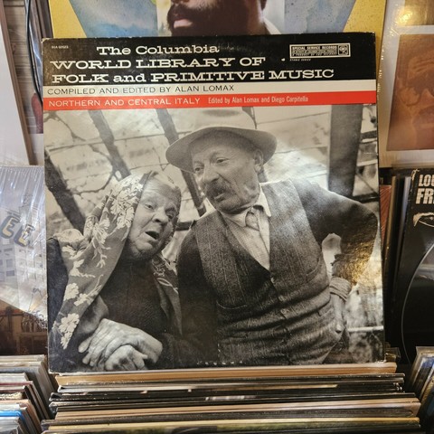 Album cover features a map of Italy. Back album cover features a black and white photograph of an elderly Italian couple.