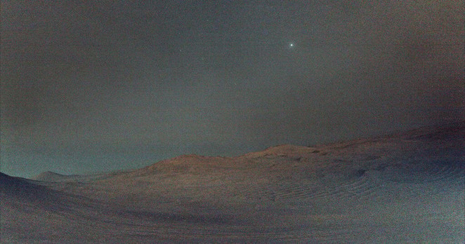 Perseverance Captures Martian Moon Shining in the Sky Before Sunrise