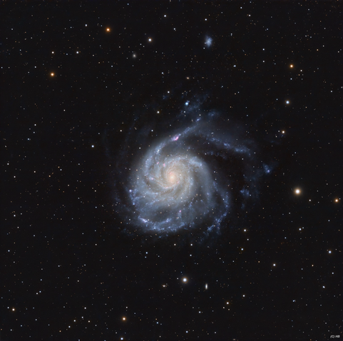 A spiral galaxy with crooked arms that tell past stories of galactic interactions. Billions of stars want to flee for a better place, but the immense gravity of this monster simply don’t let them.