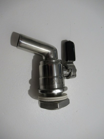 A stainless steel tap for a heated kettle.