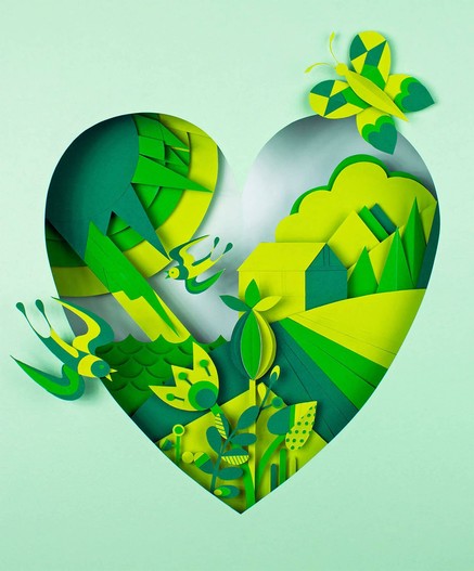 A vibrant green heart shape crafted from layered paper, featuring birds, a butterfly, and a tranquil landscape of hills and plants.