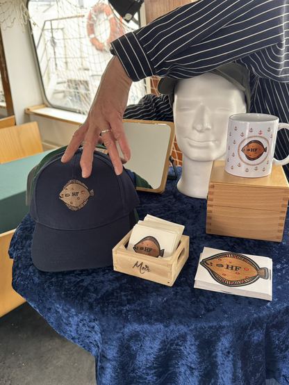 Schollenfest Merchandising Stand mit Base-Caps