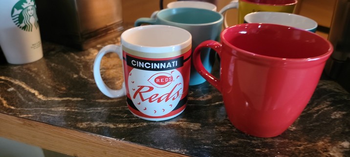Cincinnati Reds coffee mug on the Cafe desk at Church.