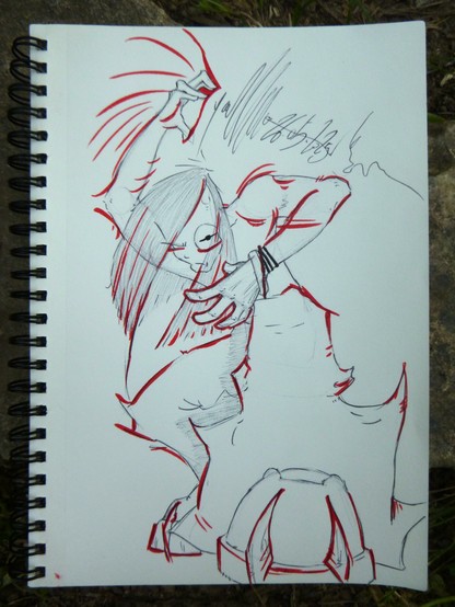 A guy in a dance-like posture. Red and black on white paper.