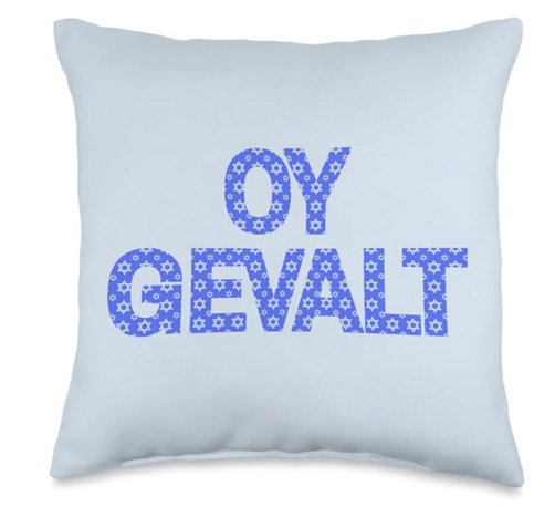 The Yiddish saying Oy Gevalt is shown on a throw pillow.