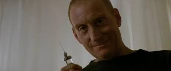 a doctor holding a syringe
