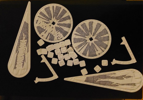 A collection of flamer templates, blast templates, 45° turn gubbinz and tokens