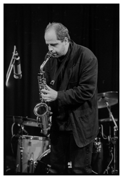 Black and white photograph of a saxophone player.