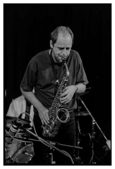 Black and white photograph of a saxophone player.