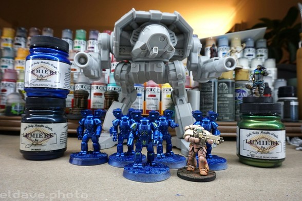 Models on my hobby desk. 5 Battletech Elementals and one Adder Omnimech that were scaled up 600% and 3d printed. There is a Warhammer 40k space marine for scale and they are the same height as the Elementals.
